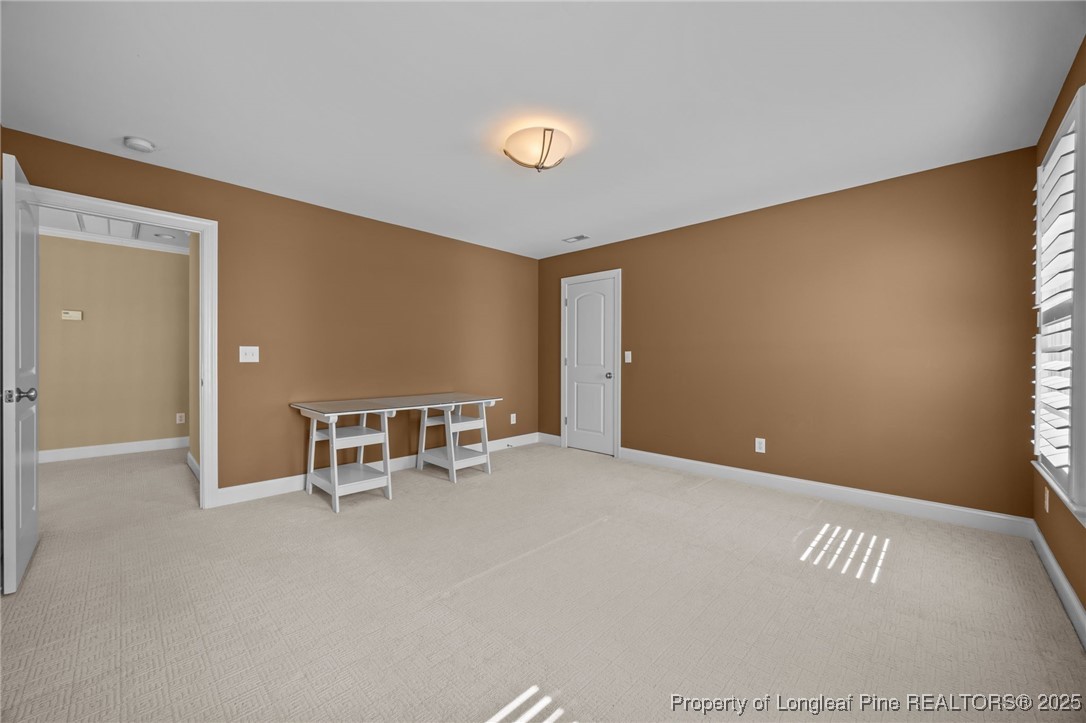 8224 Highway 210 Angier, NC 27501 - Photo 12 of 50 a view of an empty room with a window