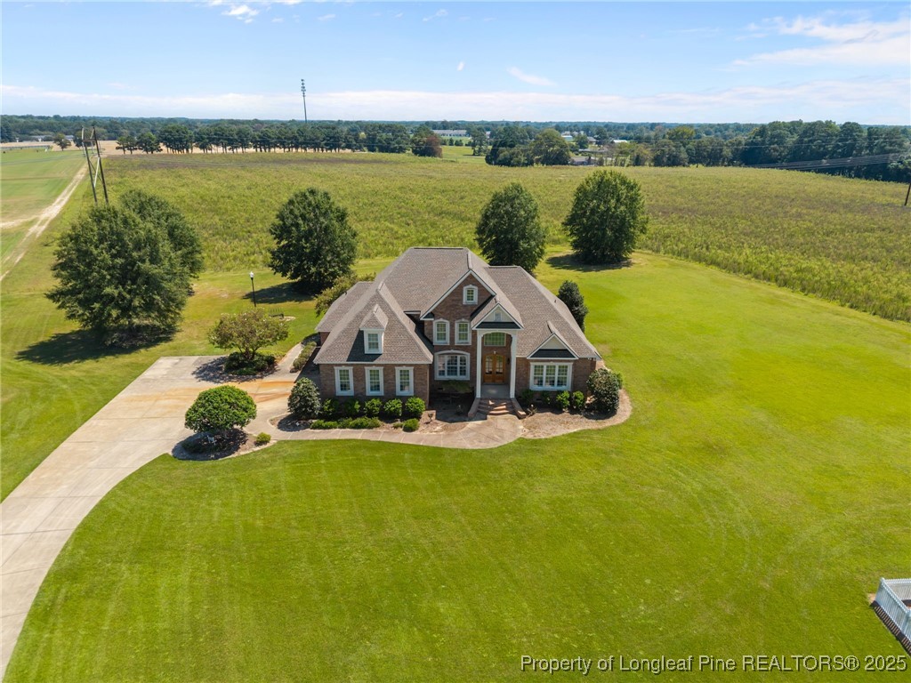 8224 Highway 210 Angier, NC 27501 - Photo 3 of 50 a view of a lake with a yard