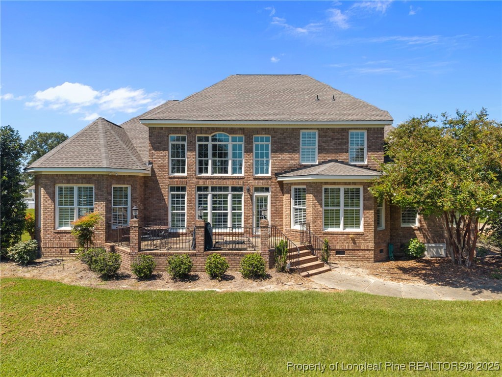 8224 Highway 210 Angier, NC 27501 - Photo 6 of 50 a front view of a house with a yard