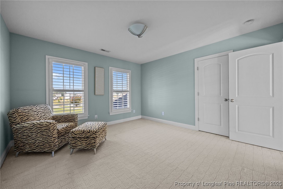 8224 Highway 210 Angier, NC 27501 - Photo 9 of 50 a room with a bed and a window