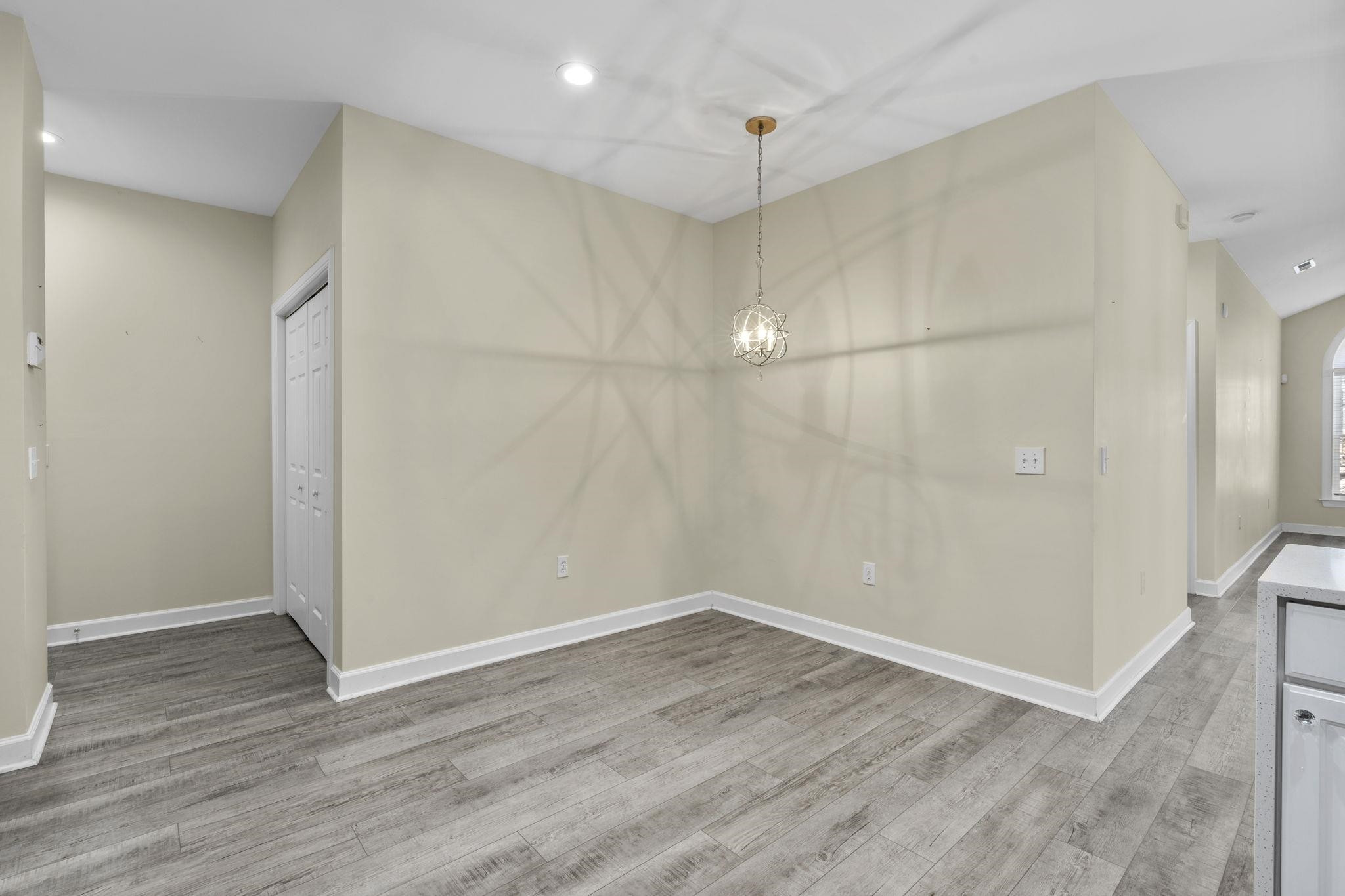 603 Rigside Place, Unit C Cary, NC 27511 - Photo 12 of 30 Breakfast Nook with New Chandelar