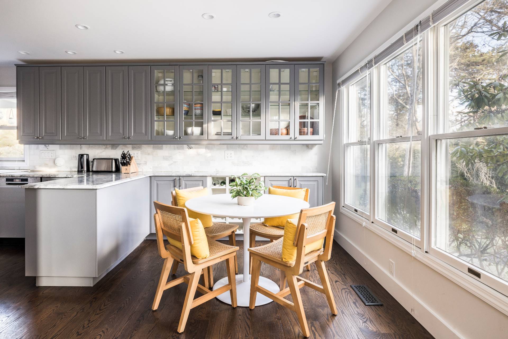 29 Petrel Road Southampton, NY 11968 - Photo 12 of 28 a kitchen with a table and chairs in it