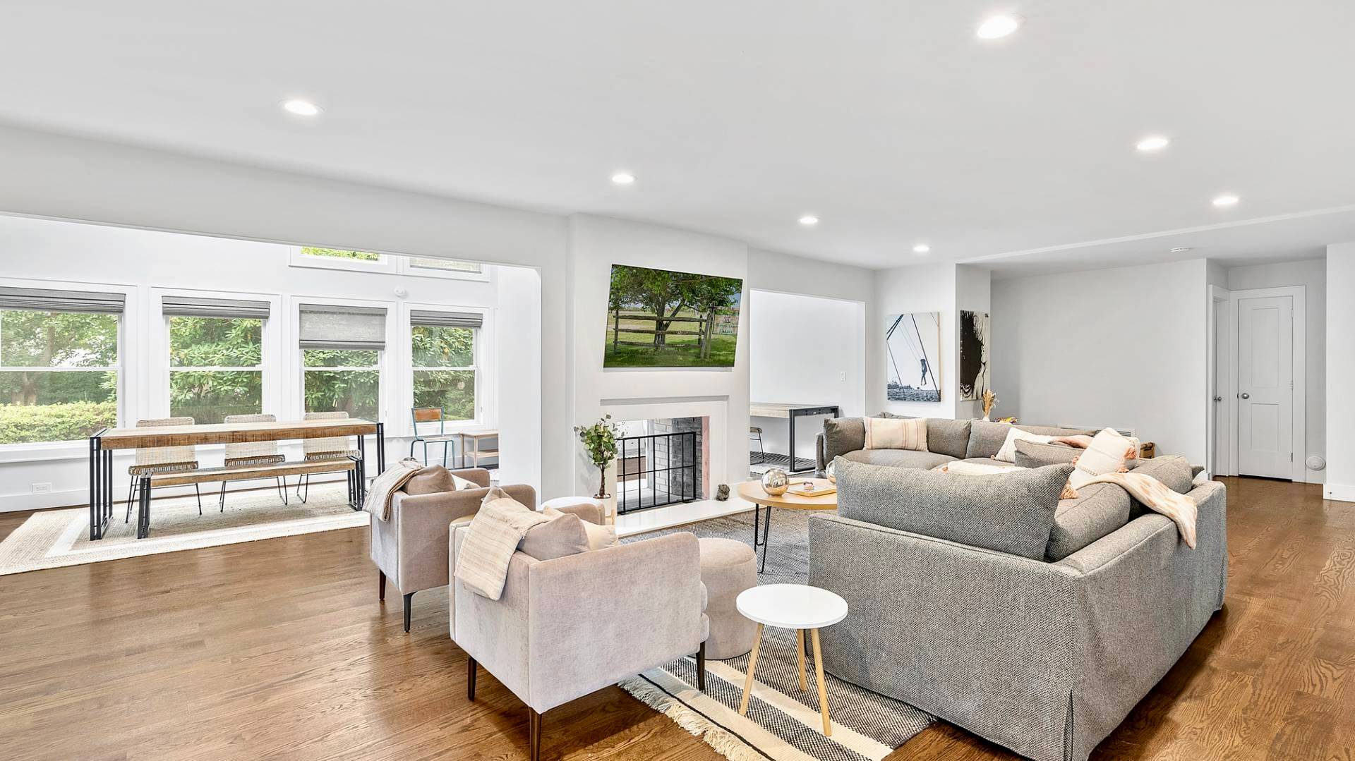 29 Petrel Road Southampton, NY 11968 - Photo 5 of 28 a living room with furniture and floor to ceiling windows