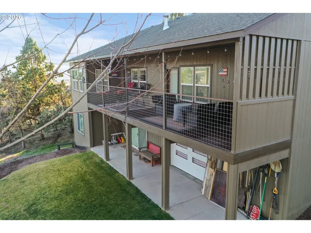 a view of living room kitchen and entryway