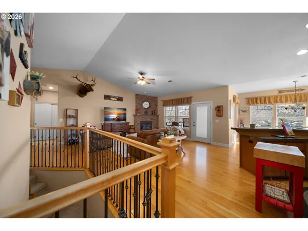 a view of livingroom with furniture wooden floor and windows
