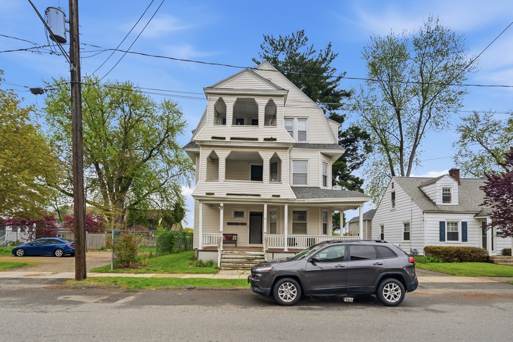 43 Elmdale Street, Unit 2 West Springfield, MA 01089 - Photo 1 of 14 a car parked in front of a building