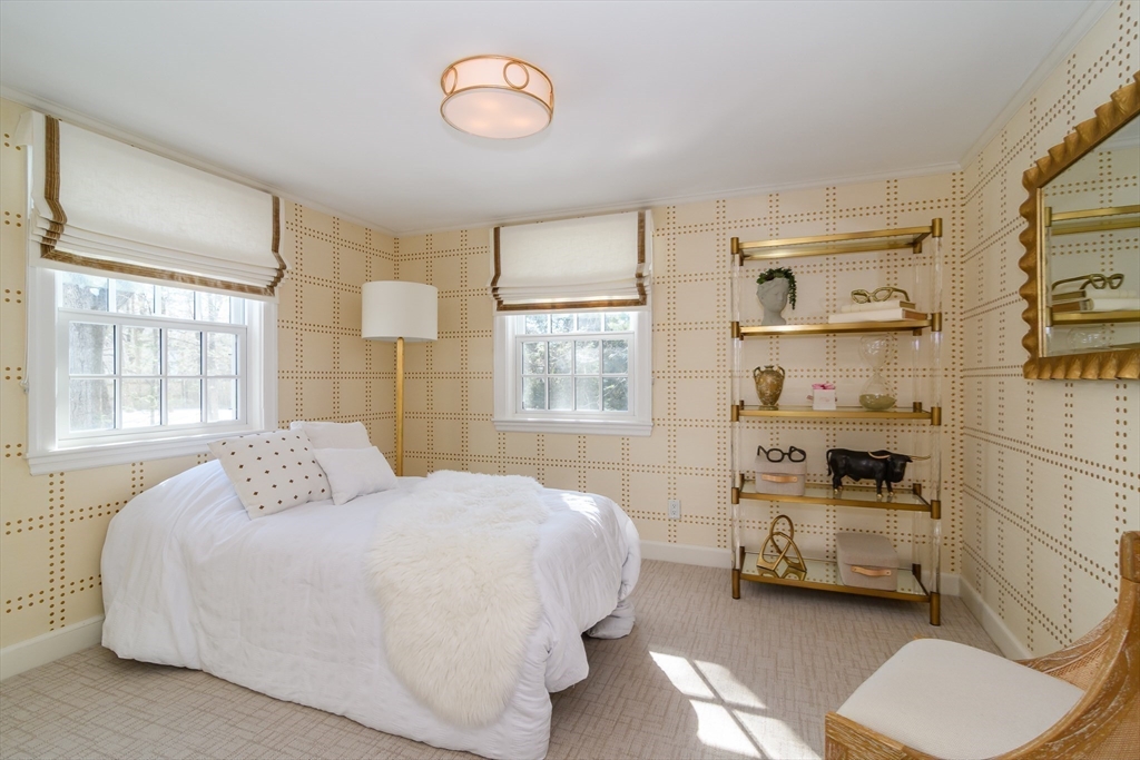 81 Audubon Road Wellesley, MA 02481 - Photo 17 of 25 a bedroom with a bed and a window