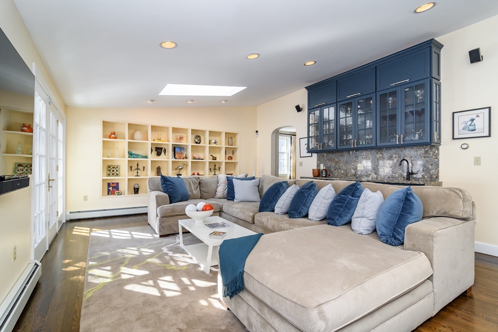 81 Audubon Road Wellesley, MA 02481 - Photo 2 of 25 a living room with furniture and a window