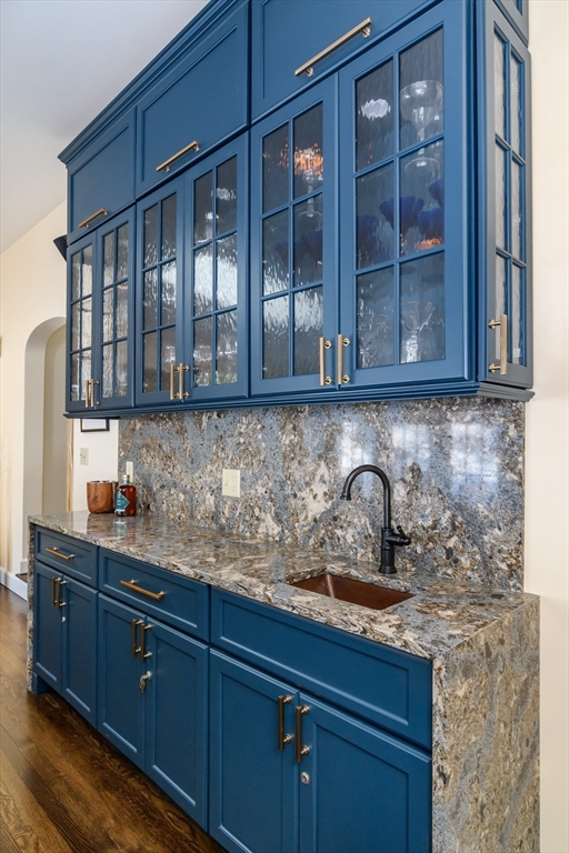 81 Audubon Road Wellesley, MA 02481 - Photo 4 of 25 a kitchen with granite countertop cabinets and window