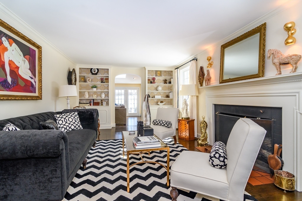 81 Audubon Road Wellesley, MA 02481 - Photo 8 of 25 a living room with furniture and a fireplace