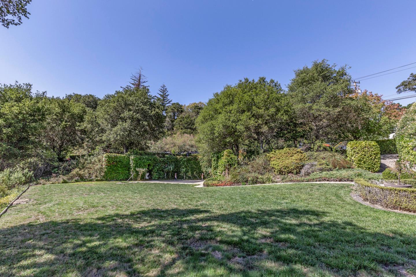835 La Honda Road Woodside, CA 94062 - Photo 25 of 26 a view of a field with trees in background