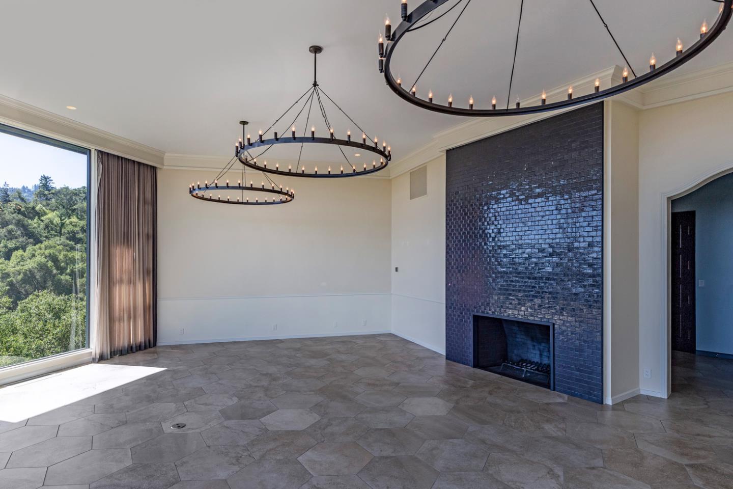 835 La Honda Road Woodside, CA 94062 - Photo 7 of 26 a view of a livingroom with furniture and a fireplace