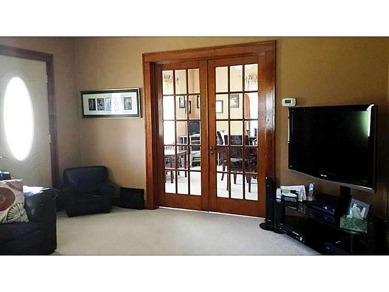 3270 Hubbard-Middlesex Road West Middlesex, PA 16159 - Photo 5 of 17 Living Room. Beautiful French Doors to Dining Room