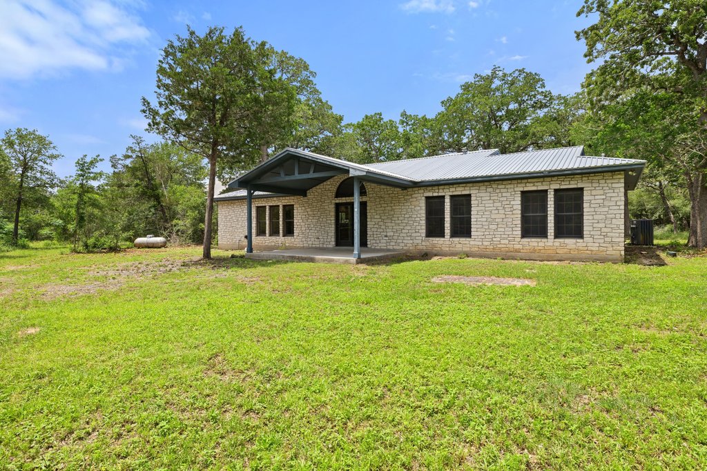 244 Woodway Elgin, TX 78621 - Photo 6 of 40 a front view of house with yard and green space