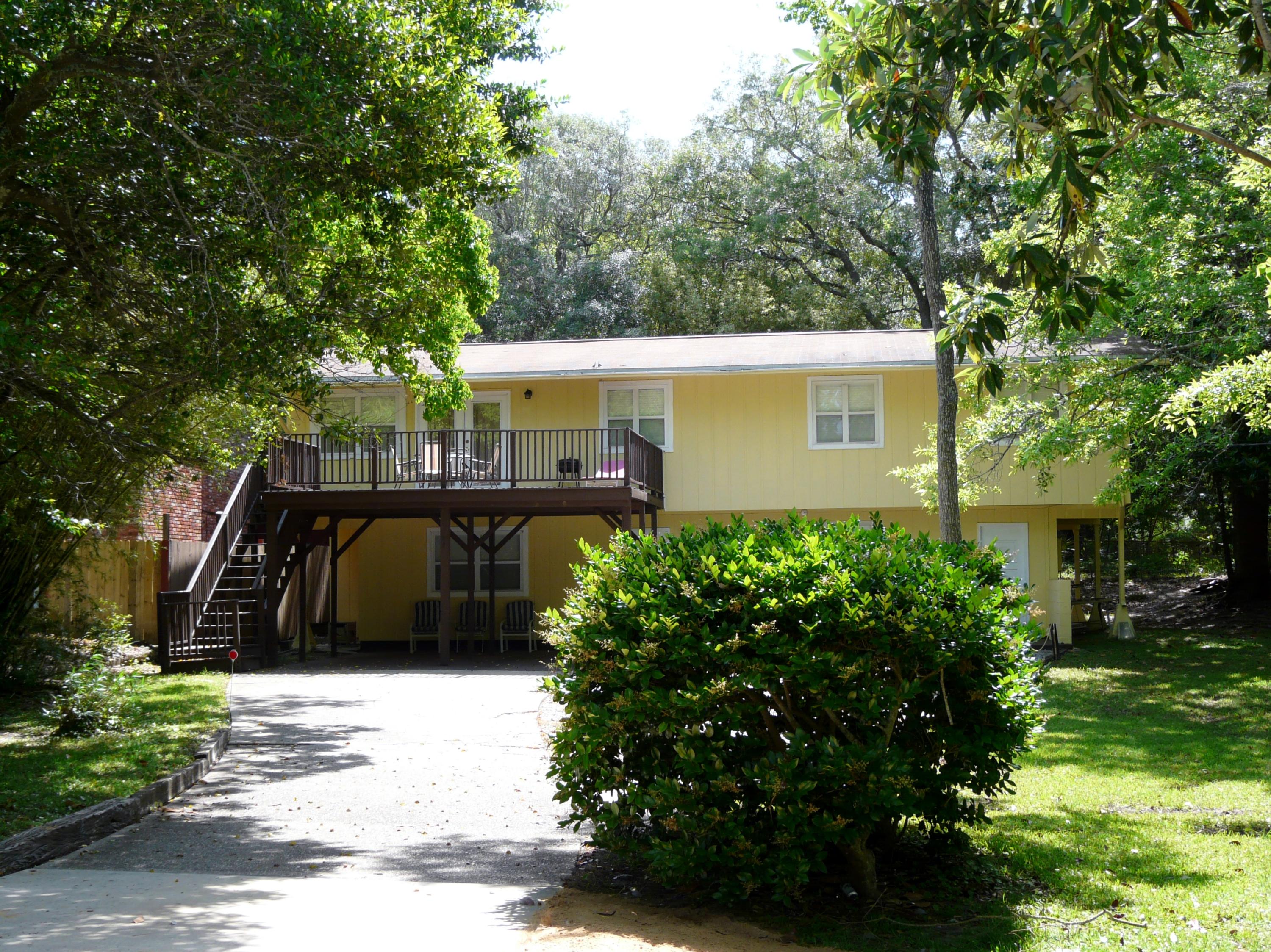 14 6th Street Shalimar, FL 32579 - Photo 3 of 23 a view of house with backyard and a garden
