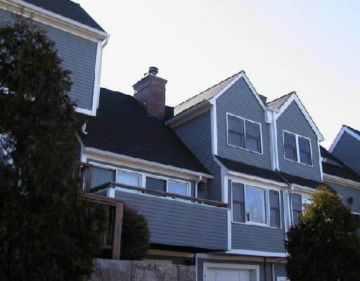 65 Wilton Crest Road, Unit 65 Wilton, CT 06897 - Photo 1 of 1 a view of a house with a balcony