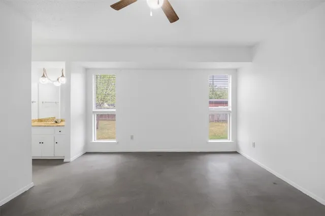 an empty room with windows