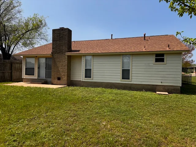 a house view with a outdoor space