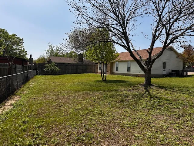 a view of a garden with trees