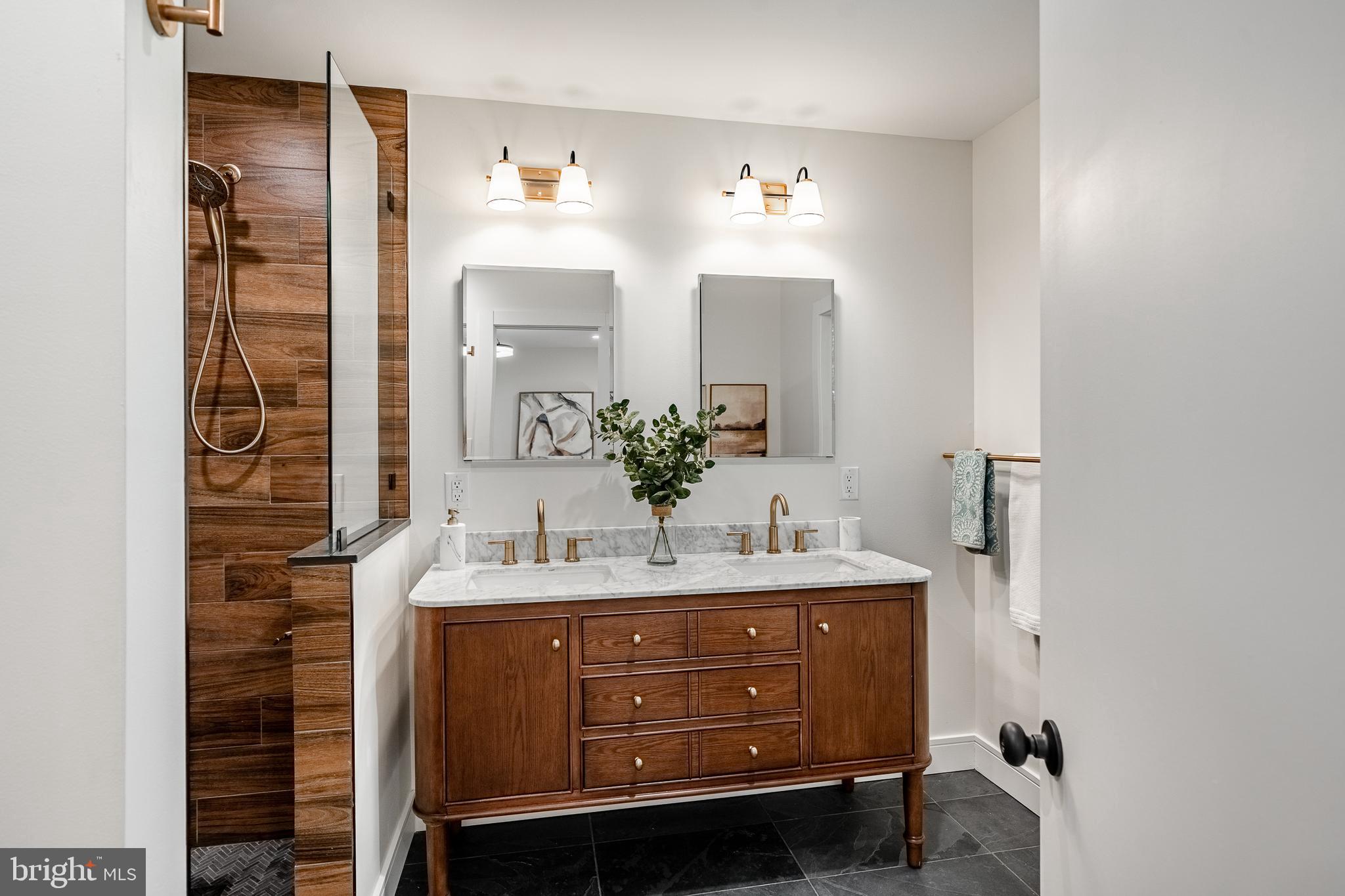 129 Chambers Road Toughkenamon, PA 19374 - Photo 32 of 60 a bathroom with a sink and a mirror