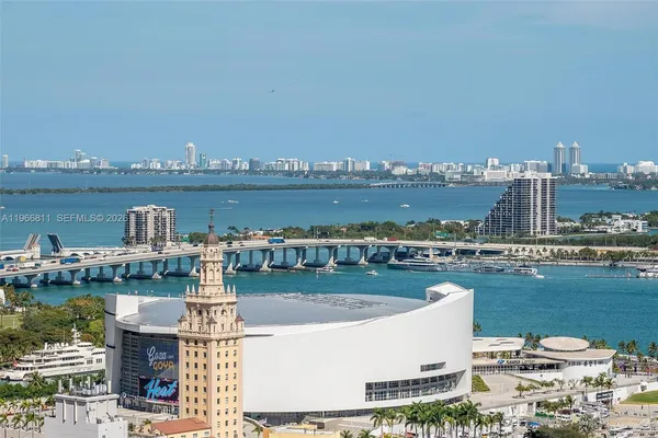 a view of a lake with building in front of it