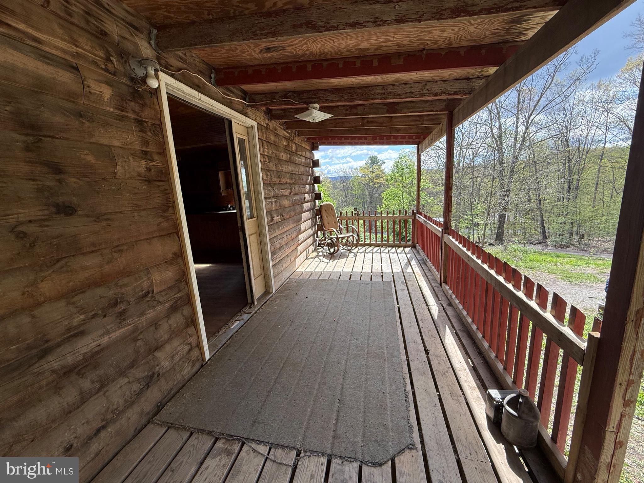 15232 Wrangletown Road Mount Union, PA 17066 - Photo 13 of 92 Rustic porch with serene views.