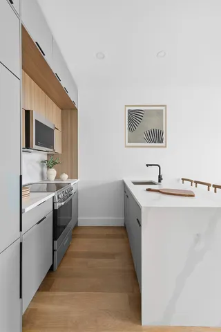 a spacious bathroom with a sink and a bathtub