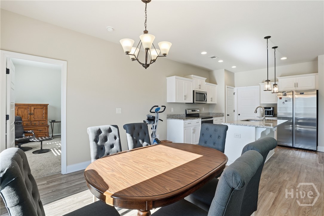 141 Haydon Court Rincon, GA 31326 - Photo 8 of 43 Dining Room and Kitchen View