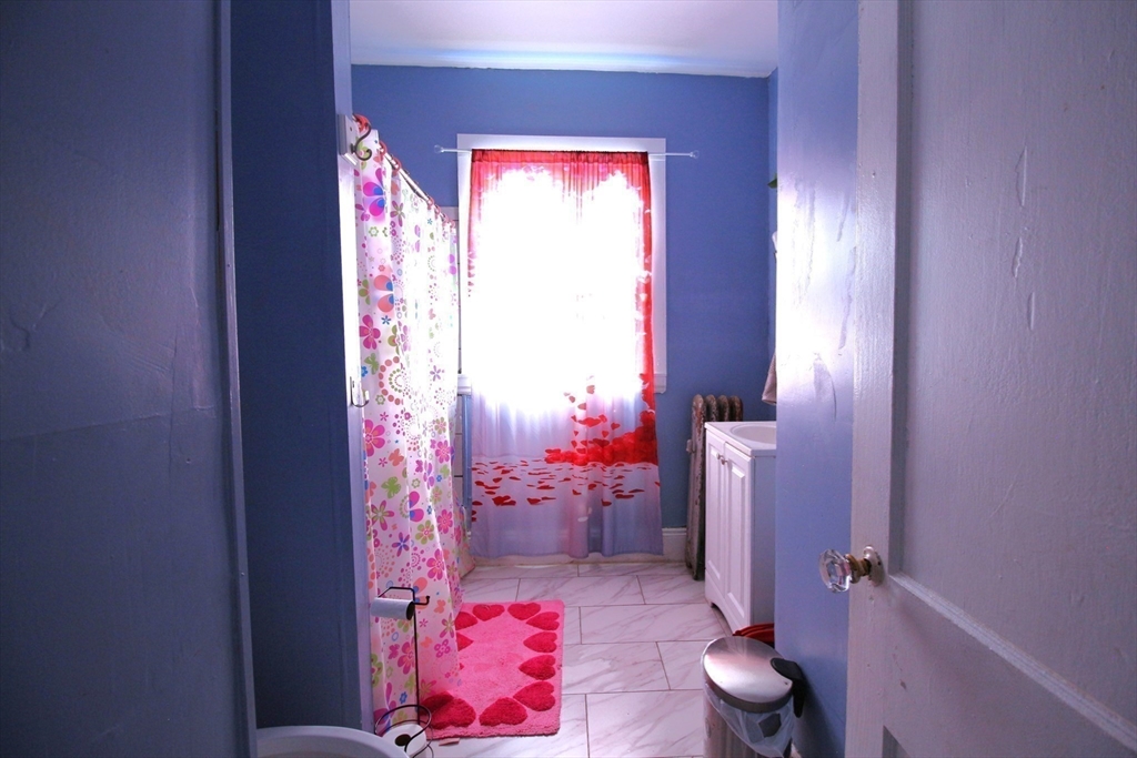 61 Kimberly Avenue Springfield, MA 01108 - Photo 13 of 39 a bathroom with a sink toilet and shower