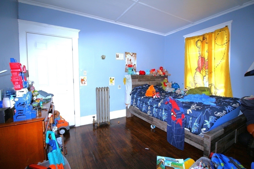 61 Kimberly Avenue Springfield, MA 01108 - Photo 14 of 39 a bed room with furniture and a window