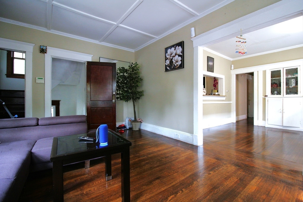 61 Kimberly Avenue Springfield, MA 01108 - Photo 16 of 39 a living room with furniture and a wooden floor