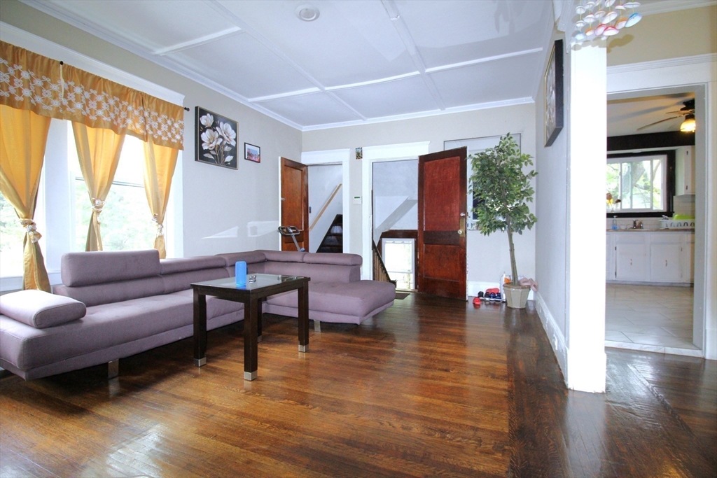 61 Kimberly Avenue Springfield, MA 01108 - Photo 18 of 39 a living room with furniture and a wooden floor