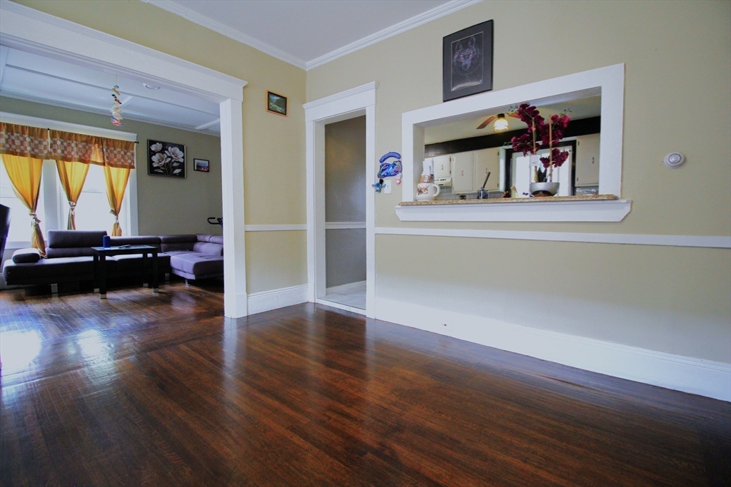 61 Kimberly Avenue Springfield, MA 01108 - Photo 19 of 39 a bedroom with wooden floor and a window
