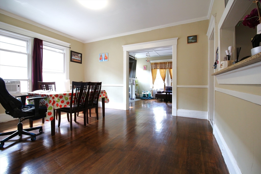 61 Kimberly Avenue Springfield, MA 01108 - Photo 20 of 39 a view of a dining room with furniture window and wooden floor
