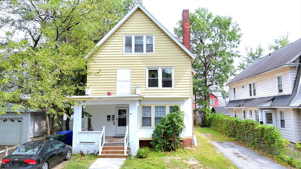 61 Kimberly Avenue Springfield, MA 01108 - Photo 2 of 39 a front view of a house with a yard