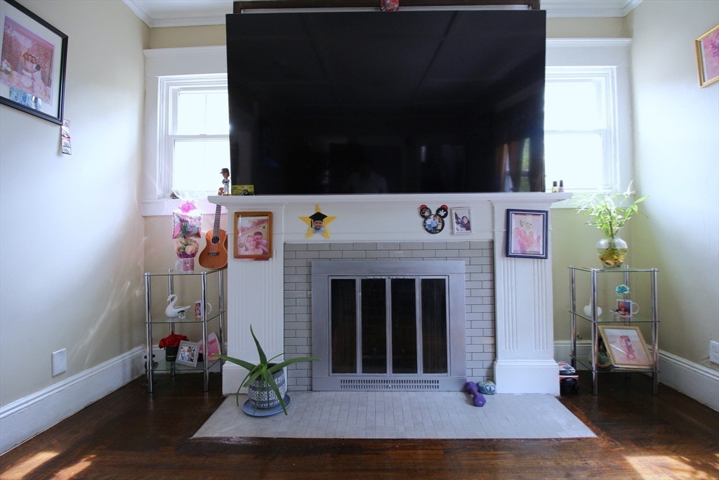 61 Kimberly Avenue Springfield, MA 01108 - Photo 21 of 39 a view of living room with furniture and a fireplace