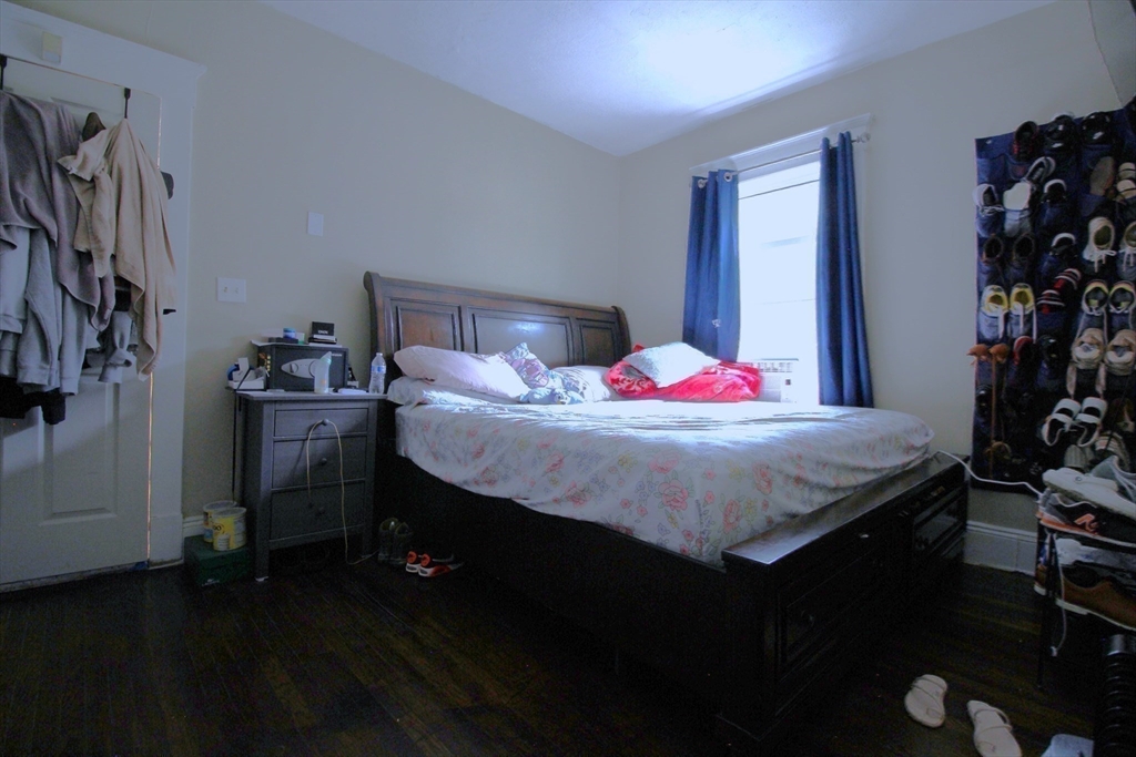 61 Kimberly Avenue Springfield, MA 01108 - Photo 27 of 39 a bedroom with a bed and a dresser