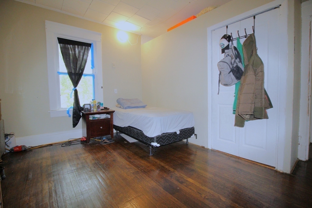 61 Kimberly Avenue Springfield, MA 01108 - Photo 28 of 39 a room with a window and a table