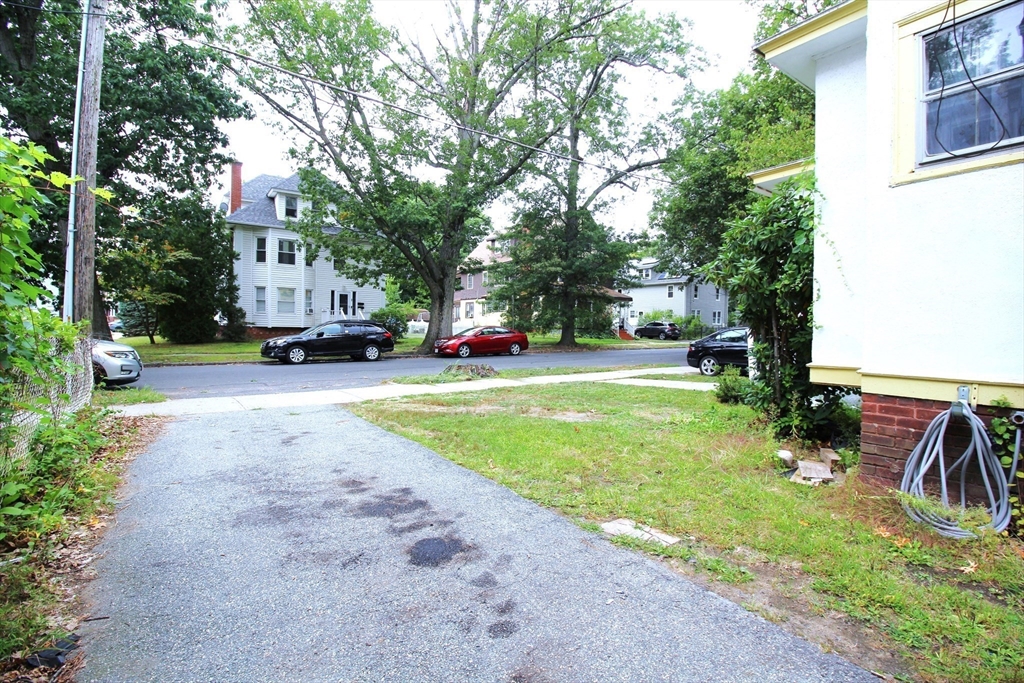 61 Kimberly Avenue Springfield, MA 01108 - Photo 3 of 39 a view of street with parked cars