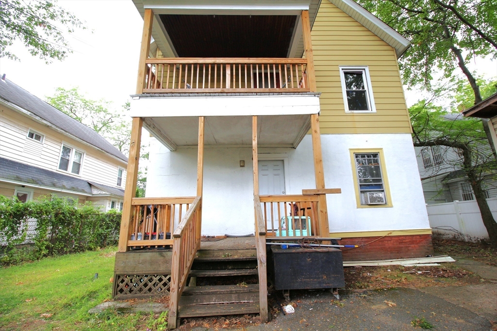 61 Kimberly Avenue Springfield, MA 01108 - Photo 6 of 39 a front view of a house with barbeque oven
