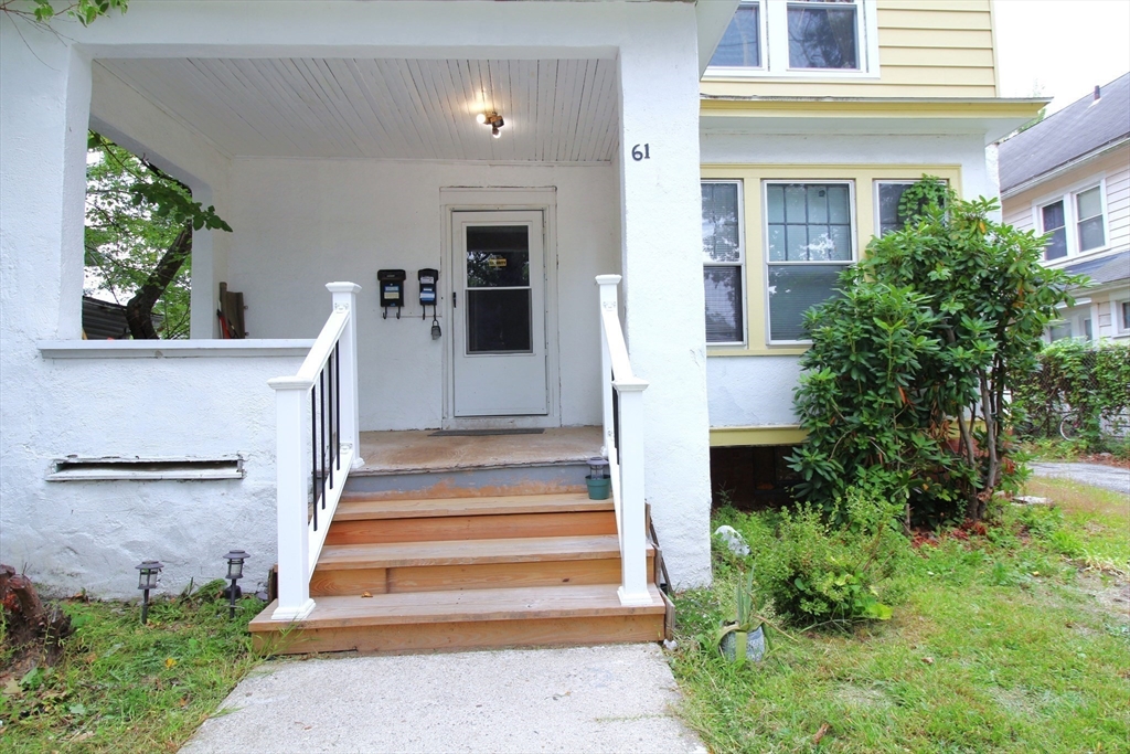 61 Kimberly Avenue Springfield, MA 01108 - Photo 7 of 39 a front view of a house with a porch
