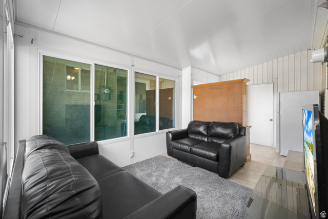 3233 Jean Street Magna, UT 84044 - Photo 11 of 33 Room with white paneled walls and ceiling, featuring multiple large windows
