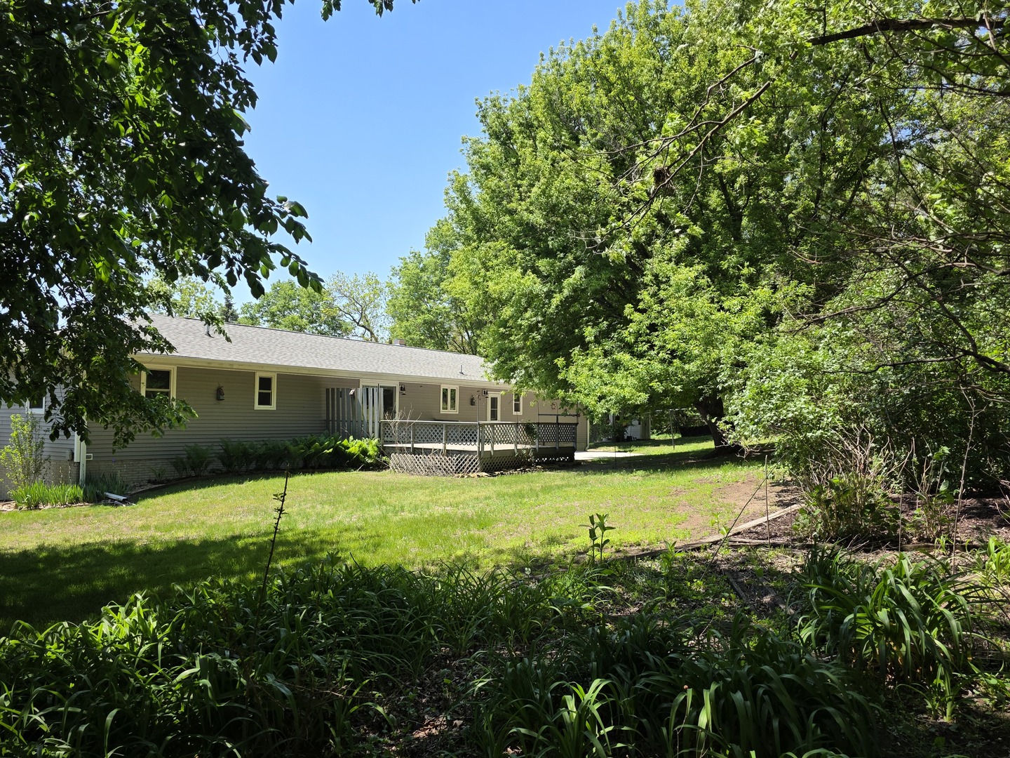 15510 Lomax Road Prophetstown, IL 61277 - Photo 23 of 24 a view of a house with a yard and sitting area