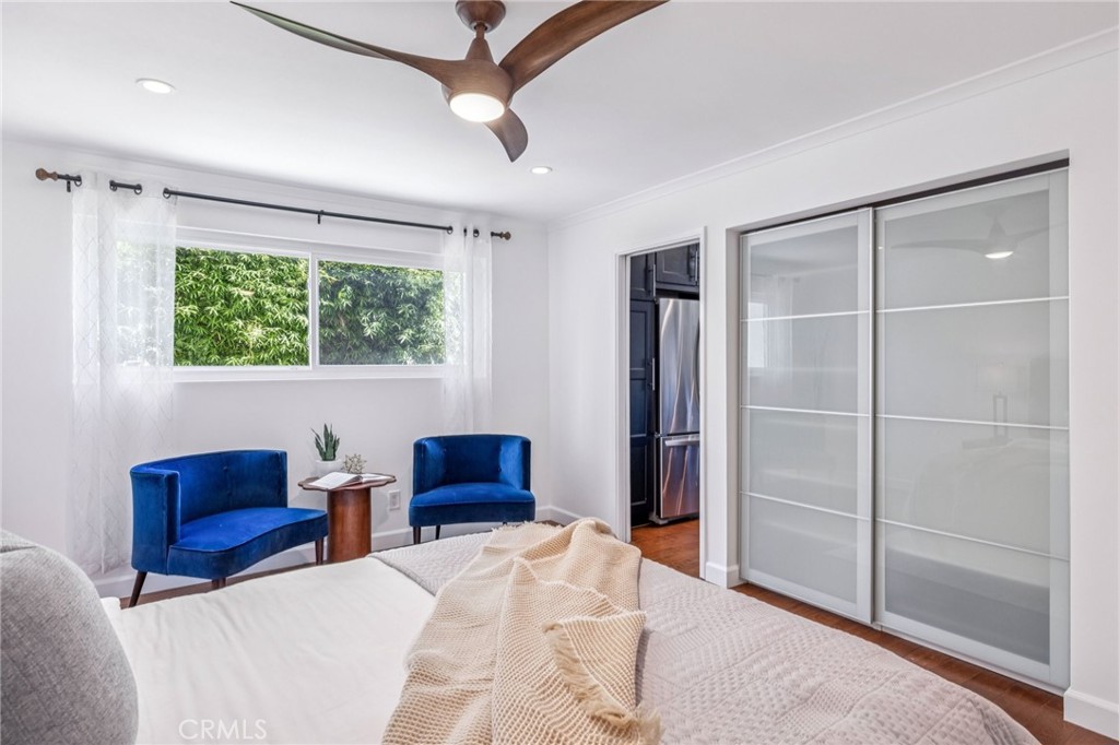 2015 Bataan Road, Unit 102 Redondo Beach, CA 90278 - Photo 15 of 43 a bedroom with furniture and window