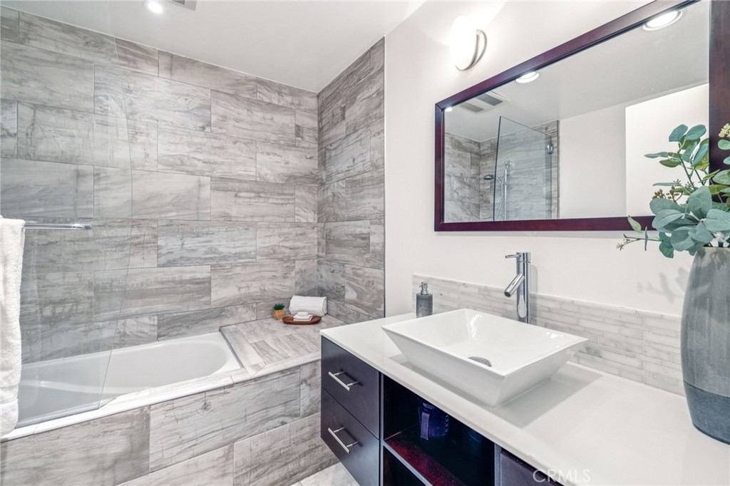 2015 Bataan Road, Unit 102 Redondo Beach, CA 90278 - Photo 20 of 43 a bathroom with a sink and a bathtub