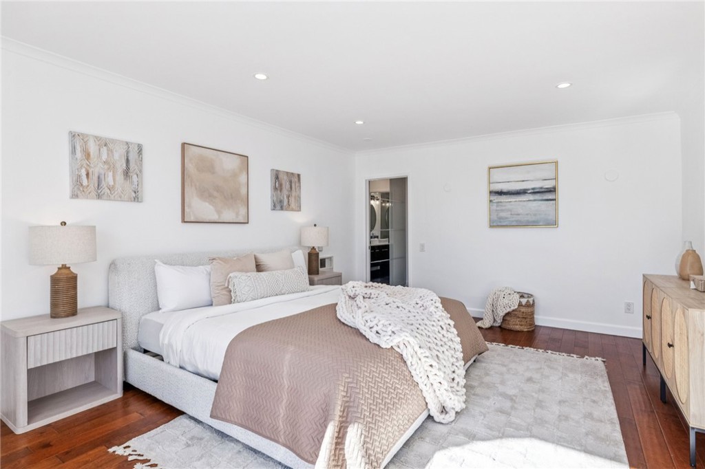 2015 Bataan Road, Unit 102 Redondo Beach, CA 90278 - Photo 25 of 43 a bedroom with a bed and a couch