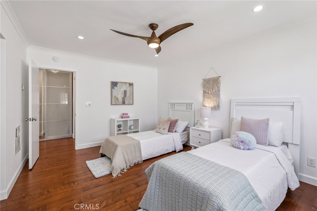 2015 Bataan Road, Unit 102 Redondo Beach, CA 90278 - Photo 29 of 43 a bedroom with two beds and a table