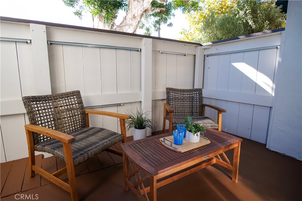 2015 Bataan Road, Unit 102 Redondo Beach, CA 90278 - Photo 36 of 43 a view of a outdoor seating area with furniture