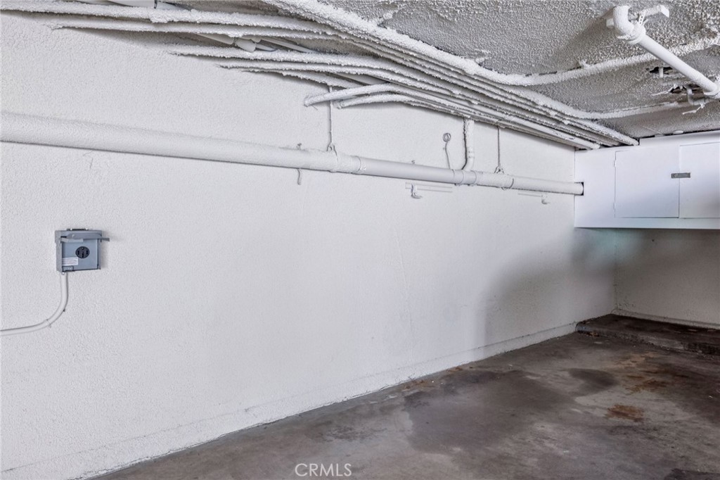 2015 Bataan Road, Unit 102 Redondo Beach, CA 90278 - Photo 39 of 43 a view of a room with racks on the wall