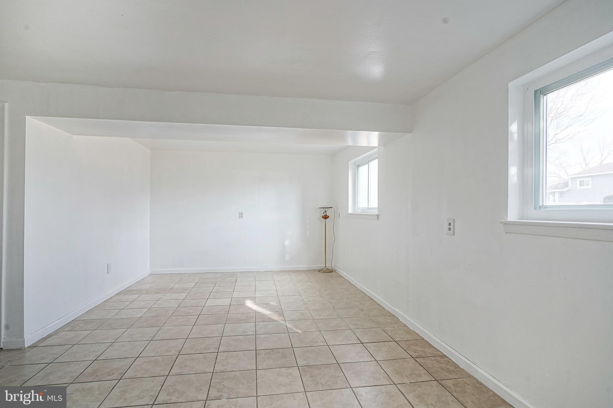 220 College Drive Pemberton, NJ 08068 - Photo 25 of 28 an empty room with windows
